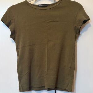 Brandy Melville Ashlyn crop top in a sage green color.